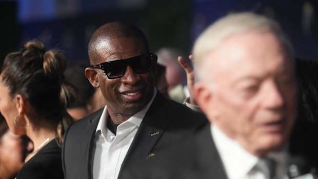 Deion Sanders walks the red carpet before the NFL Honors awards special at the Phoenix Convention Center on Thursday, Feb. 9, 2023.